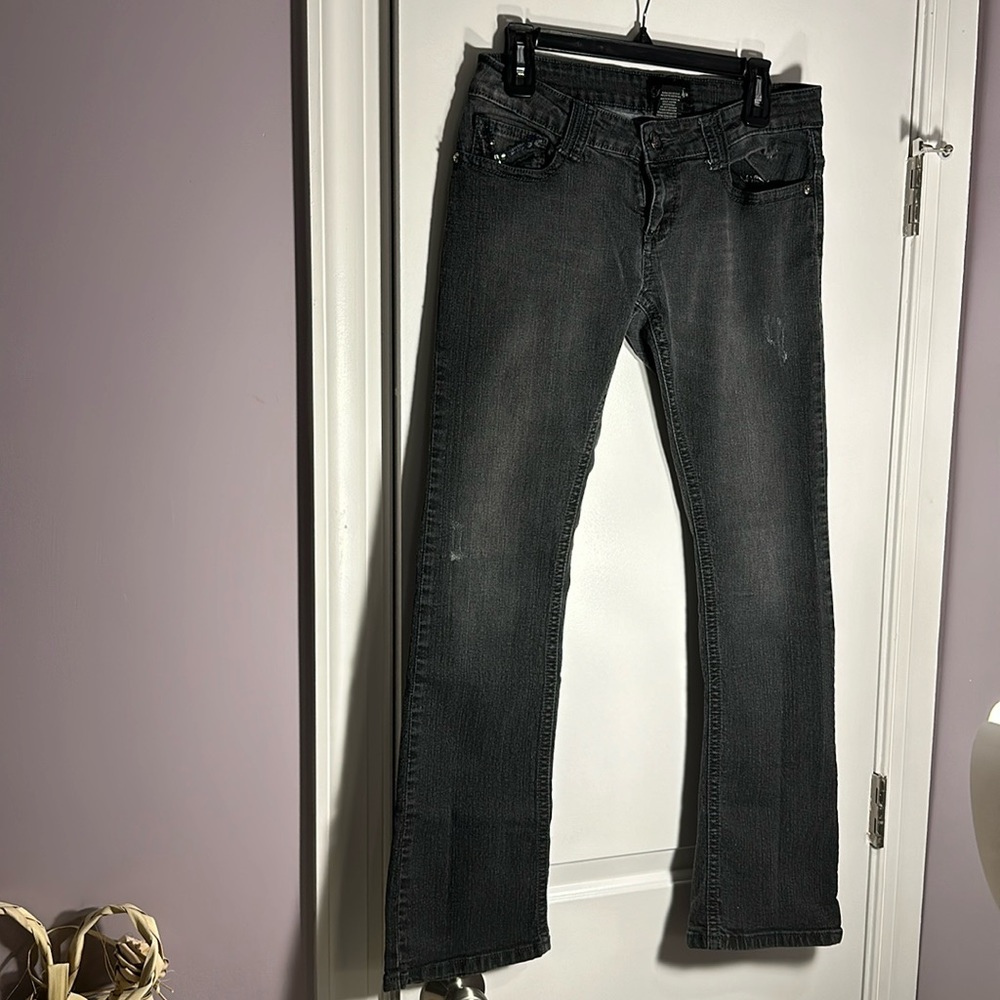 Distressed black jeans with black sequins
